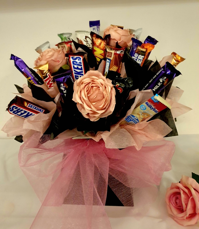 Confectionery and artificial flower bouquet