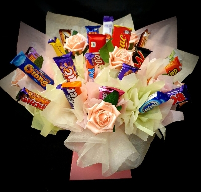 Confectionery and artificial flower bouquet