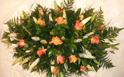 White Lilies with orange Roses Coffin Spray