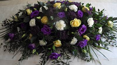 Yellow Roses, with white and purple flower Coffin Spray